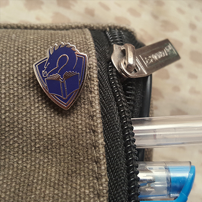 Tolarian Community College Lapel Pin